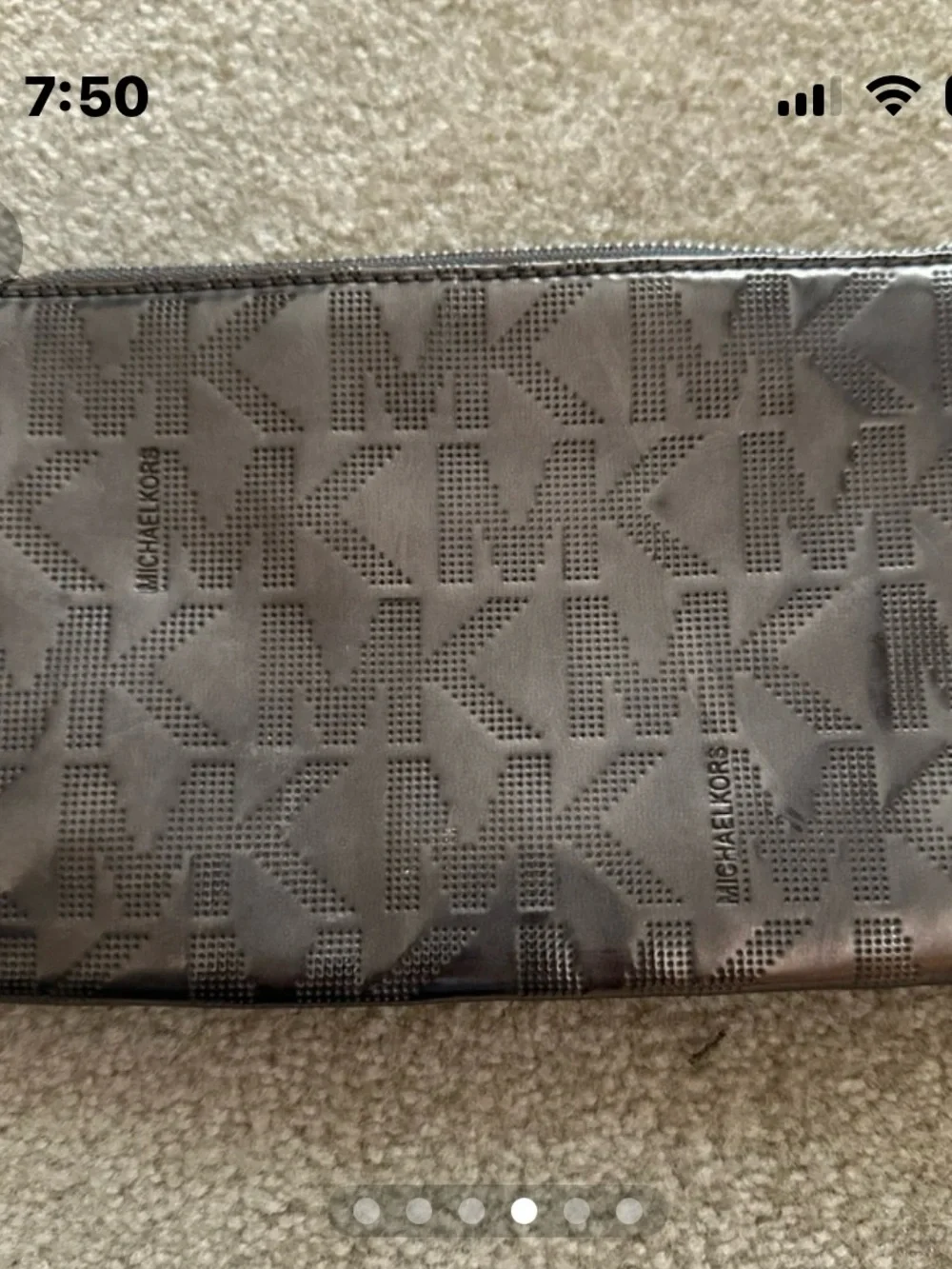 Michael Kors Metallic Gray MK Embossed Wristlet